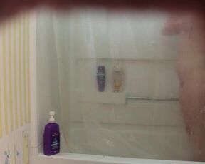 Hardly 18 dame is having a douche not knowing that her step-step-brother is seeing her