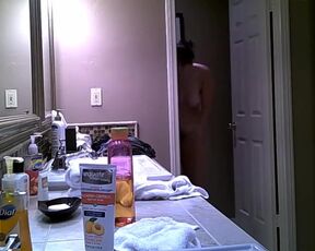 Hidden Cam - Topless girl and her friend in the bathroom