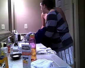 Hidden Cam - Topless girl and her friend in the bathroom