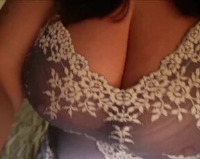 Big-Titted Girl taunting around in couch wearing her boobs