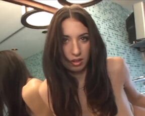 Teasing in Front of the Mirror with her Natural Tits