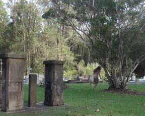 Naked Girl at the Cemetery. Busty talk about the eternal