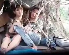 A young guy is licking his girl’s sweet pussy, while a horny voyeur is making a video