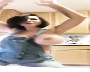 Big-Chested chick dancing in